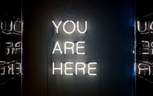 sign that reads, you are here